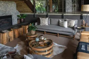 Unwind in the main lodge lounge between game drives. This lounge has a cosy fireplace for cooler winter evenings. 