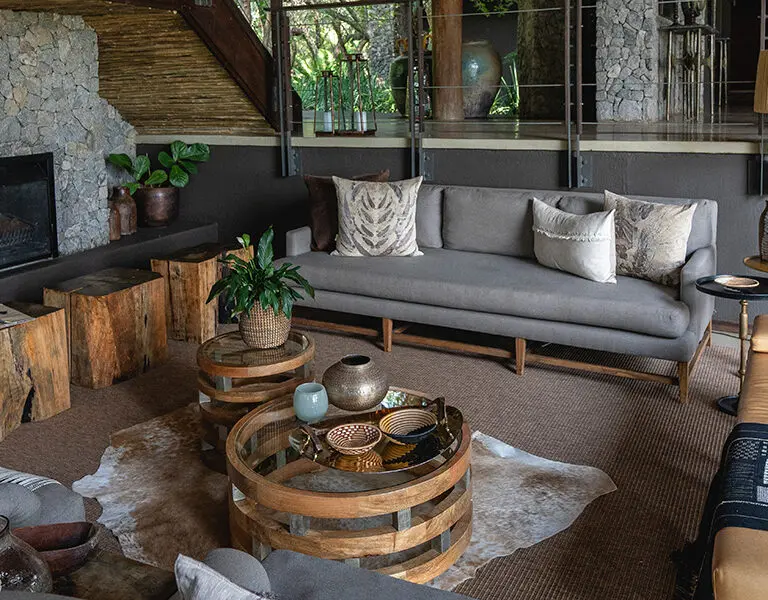 Unwind in the main lodge lounge between game drives. This lounge has a cosy fireplace for cooler winter evenings. 