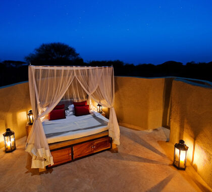 This gorgeous luxury suite enjoys the fresh open-air, a truly authentic Kenyan experience.
