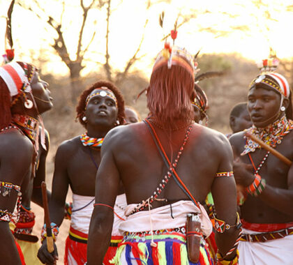 A group of young Samburu warriors join together in dance and song.