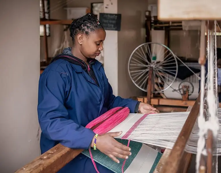 Visit Shanga, where local entrepreneurs create crafts including weaving, beading and coffee bean roasting. 