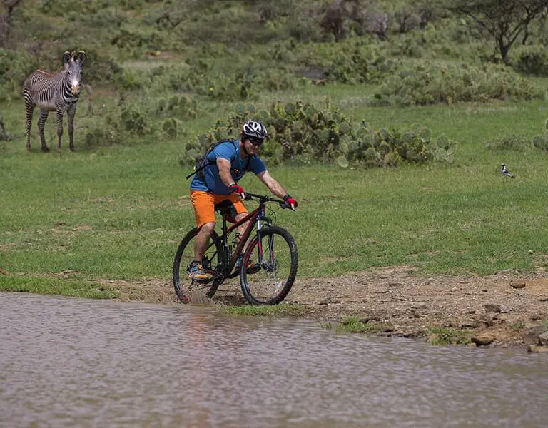 Hop on a mountain bike for a completely different way to explore the Laikipia Plains.