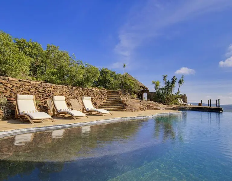 The beautiful infinity pool transports you into the African plains and is an ideal spot to relax during the day.