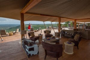 The communal lounge showcases unhindered views across Laikipia’s mottled landscape, all the way to Mount Kenya.