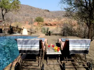 Etali overlooks a well-frequented waterhole; you're likely to spot animals - including big game like elephants - from the deck!

