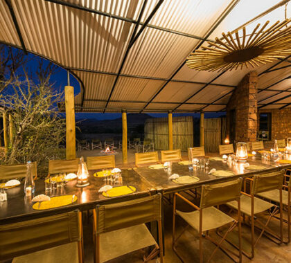 Homely meals are enjoyed with fellow guests & guides in Etendeka's open-sided mess tent.