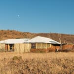 En suite bathrooms feature water-wise bucket showers, flush toilets & solar-heated water.