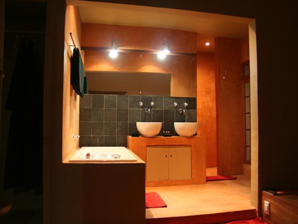The en suite bathrooms have a bath and separate shower
