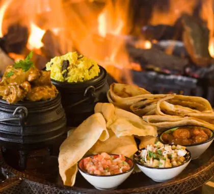 La comida malaya de Sudáfrica, picante y especiada, se disfruta mejor en invierno y se sirve delante de una chimenea de leña.