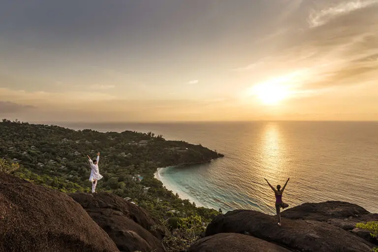 Take part in a hilltop yoga and meditation class overlooking Petite Anse Bay.