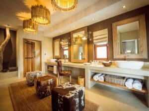 Spacious en suite bathrooms feature al-fresco showers with thrilling views of the surrounding bush.