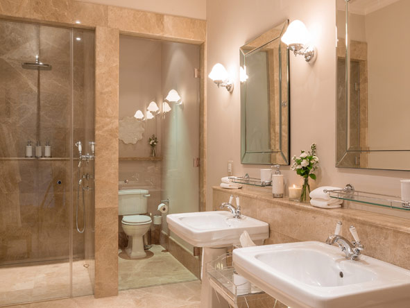 Generous bathrooms are clad in marble and offer a tranquil and opulent space to unwind after the day.
