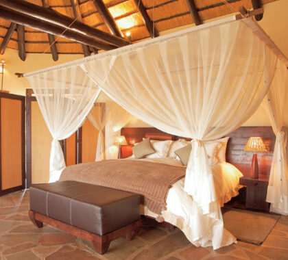 Air conditioning & draped mosquito nets ensure a good night's sleep at Goche Ganas.
