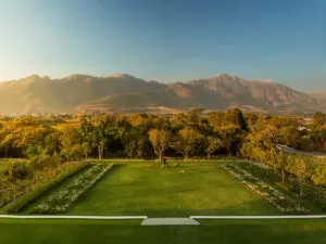 The towering Dassenberg Mountains can be viewed from the beautifully manicured grounds.
