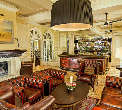 A plush bar with leather seats.