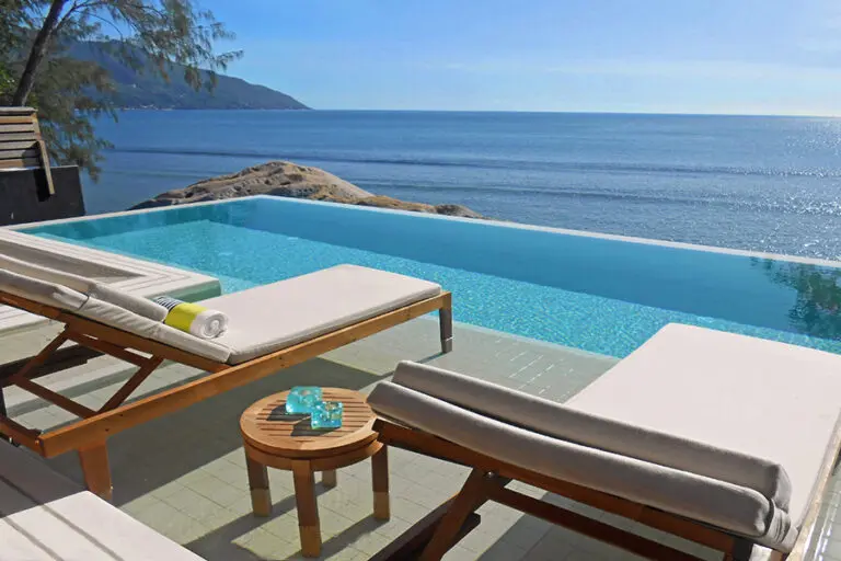 Pool loungers overlook the ocean in the Oceanview Pool Villas.