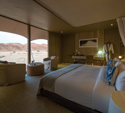 Wake up & watch the desert slip from one colour to another from the vantage of your bed.