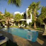 Have a swim in the pool which is heated in winter and nestled in the established gardens
