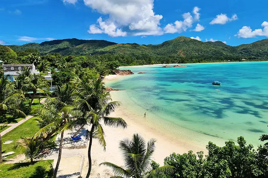 Palm fringed beaches in front of Hotel L'Archipel.