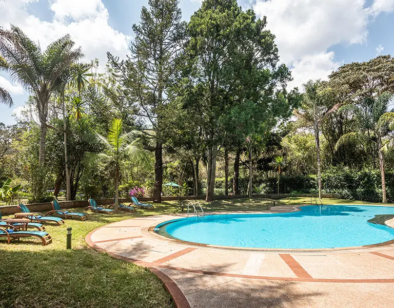 After you've arrived in Nairobi, settle into your room at House of Waine and then enjoy a refreshing dip in the swimming pool.