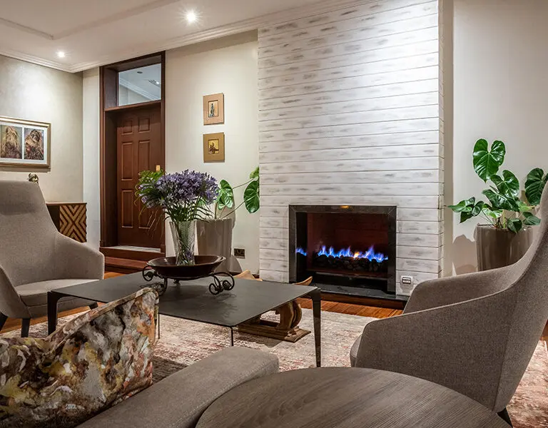 The welcoming main lounge is a wonderful spot to enjoy a glass of wine; why not settle in next to the fire for some great conversation?