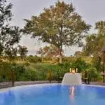 Take a refreshing dip in the swimming pool. 