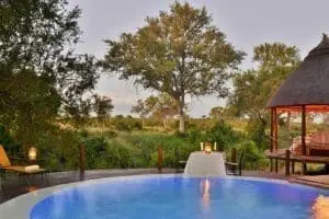 Take a refreshing dip in the swimming pool. 