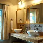 Bathrooms come complete with cotton bath robes & a full range of Charlotte Rhys toiletries.