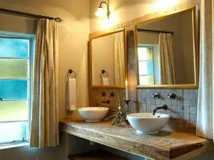 Bathrooms come complete with cotton bath robes & a full range of Charlotte Rhys toiletries.