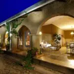 The original 1928 family home has been beautifully converted into a haven of cool, colonial charm.