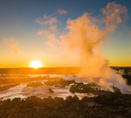 Victoria Falls at sunset.