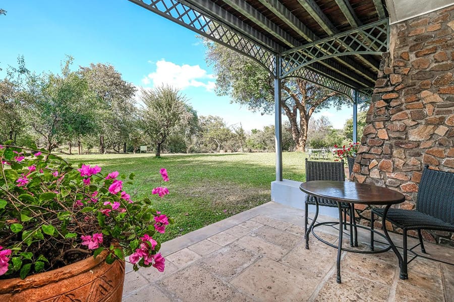 ilala-lodge-standard_room_patio_to_garden_-_ilhjpeg