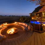 Enjoy pre-dinner drinks around the firepit at the Jao Villa.