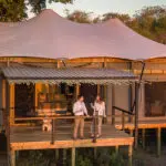 Take in the sunset from your private tented suite. 