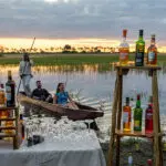 A classic Botswana sunset sundowner stop on a classic Botswana mokoro safari.