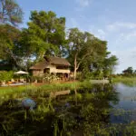 Set on an island and surrounded year round by water.