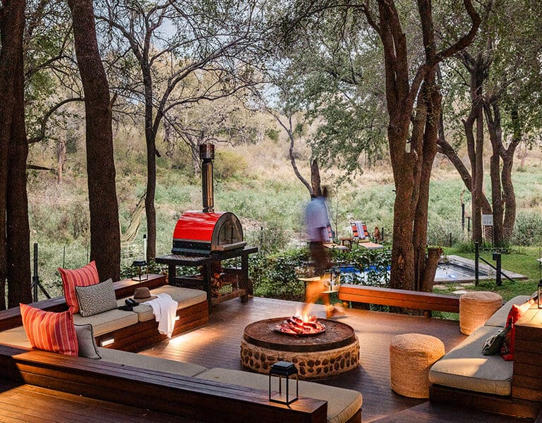 Madikwe House deck lounge and firepit.