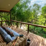 Nare Villa's upstairs room has a balcony overlooking the reserve.