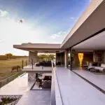 Jamala Madikwe's main lounge area opens out onto the deck, providing unmatched views of the reserve in South Africa's North West Province | Jamaica Madikwe