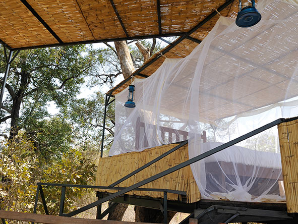 A mosquito net covers the outdoor daybed if you'd like to spoil yourself with an afternoon siesta.
