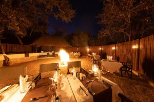 Enjoy a boma dinner outdoors around a roaring fire.
