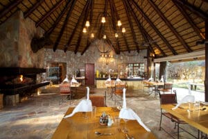 Meals are served in an open-air setting or in the indoor dining area.