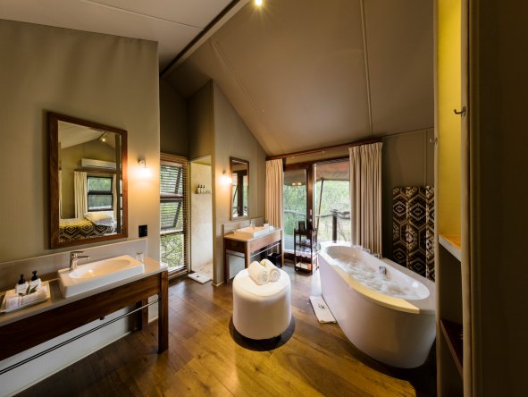 Each suite has a bathtub with a view, a shower and double vanities.