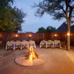 Enjoy a candlelit dinner outdoors around a roaring fire.