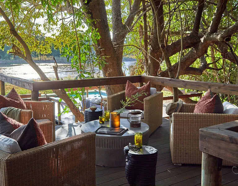 Relax on the deck with a drink from the bar.