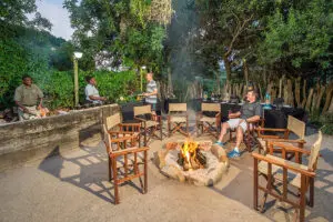 Share your safari stories with other guests, while having dinner next to the boma.