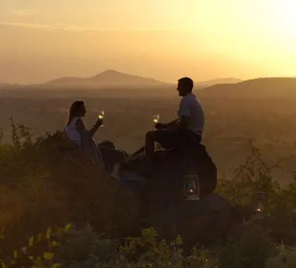 Game drives on your Kenya honeymoon tend to end with an epic view & a cold bottle of something!