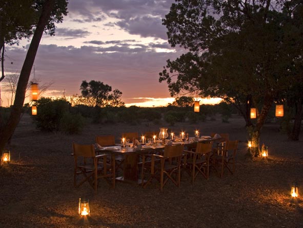 Dinner venues on a Kenya luxury safari range from grand dining rooms to candle-lit forest groves.