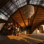 The stunning architecture framing the bar at King Lewanika Lodge. 