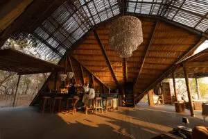 The stunning architecture framing the bar at King Lewanika Lodge. 